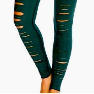 Teeki hunter green laser cut leggings